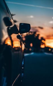 Preview wallpaper car, sunset, movement, mirror blur