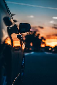 Preview wallpaper car, sunset, movement, mirror blur