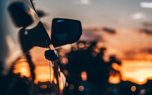 Preview wallpaper car, sunset, movement, mirror blur