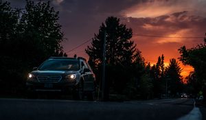 Preview wallpaper car, sunset, traffic, road, night