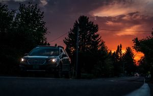 Preview wallpaper car, sunset, traffic, road, night