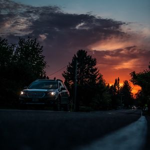 Preview wallpaper car, sunset, traffic, road, night