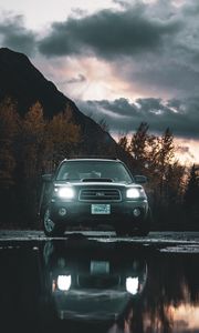 Preview wallpaper car, suv, black, water, reflection