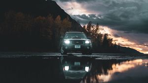 Preview wallpaper car, suv, black, water, reflection