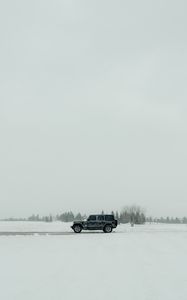 Preview wallpaper car, suv, black, snow, winter