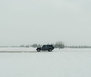 Preview wallpaper car, suv, black, snow, winter