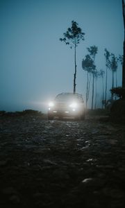 Preview wallpaper car, suv, fog, light, twilight