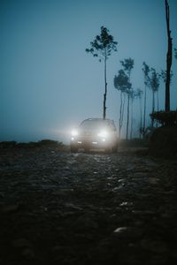 Preview wallpaper car, suv, fog, light, twilight