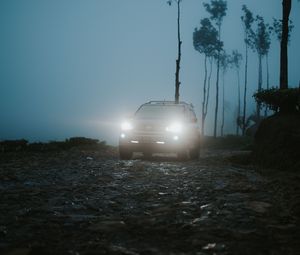 Preview wallpaper car, suv, fog, light, twilight