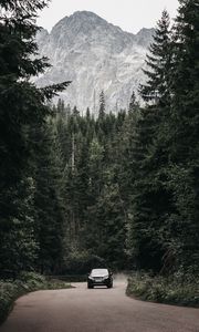 Preview wallpaper car, suv, forest, road, mountains