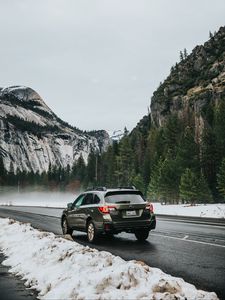 Preview wallpaper car, suv, gray, road, mountains, snow