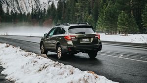 Preview wallpaper car, suv, gray, road, mountains, snow