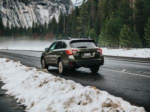 Preview wallpaper car, suv, gray, road, mountains, snow