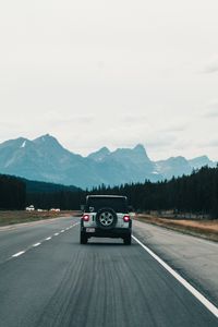 Preview wallpaper car, suv, gray, road
