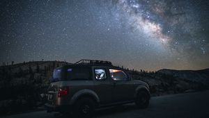 Preview wallpaper car, suv, night, mountains, starry sky