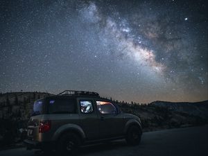 Preview wallpaper car, suv, night, mountains, starry sky