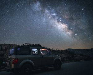 Preview wallpaper car, suv, night, mountains, starry sky