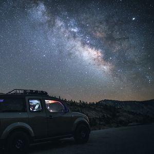 Preview wallpaper car, suv, night, mountains, starry sky