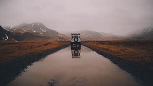 Preview wallpaper car, suv, puddle, mountains, fog, nature, iceland