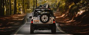 Preview wallpaper car, suv, road, forest, travel