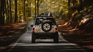 Preview wallpaper car, suv, road, forest, travel