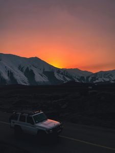 Preview wallpaper car, suv, white, sunset, mountains, road