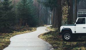 Preview wallpaper car, suv, white, road, forest