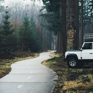 Preview wallpaper car, suv, white, road, forest