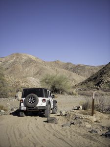 Preview wallpaper car, suv, white, canyon, hills, sand