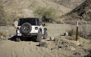 Preview wallpaper car, suv, white, canyon, hills, sand