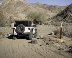 Preview wallpaper car, suv, white, canyon, hills, sand