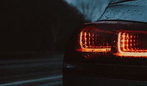 Preview wallpaper car, taillights, wet, red, dark