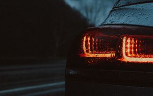 Preview wallpaper car, taillights, wet, red, dark