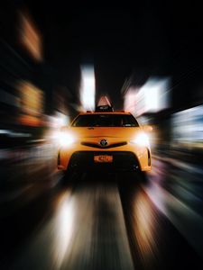 Preview wallpaper car, taxi, headlights, light, speed, movement