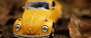 Preview wallpaper car, toy, model, yellow