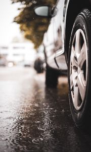 Preview wallpaper car, wheel, puddle, rain, drops