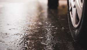Preview wallpaper car, wheel, puddle, rain, drops