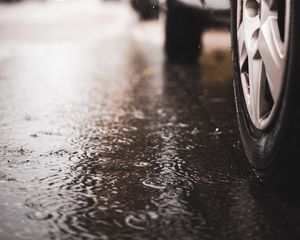 Preview wallpaper car, wheel, puddle, rain, drops