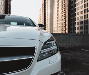 Preview wallpaper car, white, front view, buildings