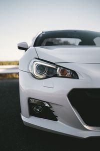 Preview wallpaper car, white, headlight, front view