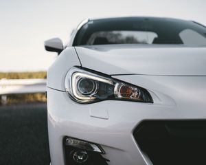 Preview wallpaper car, white, headlight, front view
