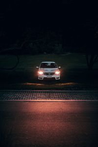 Preview wallpaper car, white, light, headlights, front view, dark
