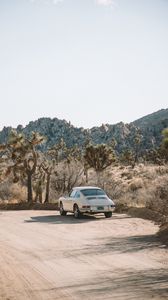 Preview wallpaper car, white, retro, road, cacti