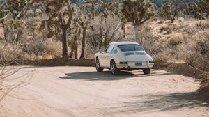 Preview wallpaper car, white, retro, road, cacti