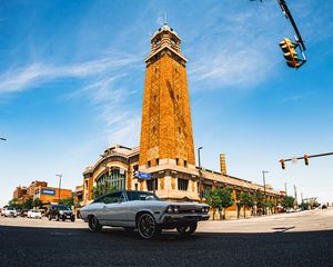Preview wallpaper car, white, retro, tower, road