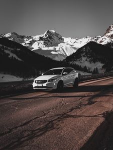 Preview wallpaper car, white, road, mountains, snow