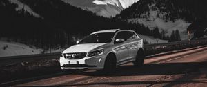 Preview wallpaper car, white, road, mountains, snow