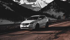 Preview wallpaper car, white, road, mountains, snow