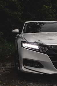 Preview wallpaper car, white, wet, headlight, light, front view