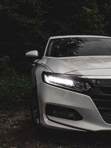 Preview wallpaper car, white, wet, headlight, light, front view